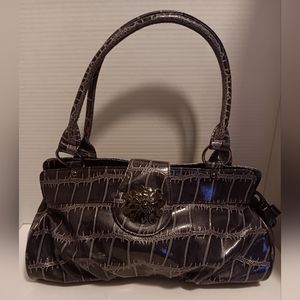 Unbranded dark purplish silver bag with a purple interior